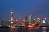 china stock photography | Shanghai's Pudong Skyline over the Huangpu River at Night, View from The Bund, Shanghai, China, Image ID CHINA-SHANGHAI-0001. 