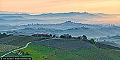  stock photography | Roddi and Hills of Barolo at Sunrise, Cuneo, Piedmont, Italy, Image ID ITALY-PIEDMONT-0005. Roddi is an ancient old town and it's located immediately outside of Alba, its medieval castle can be seen from the city, as it stands on top of a steep hill. Roddi is part of the 11 municipalities where Barolo wine is grown and offers an easy opportunity to learn about the history and culture of the Langhe region without having to travel too far from its main centre.