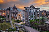  stock photography | The Roman Forum at Sunrise, Rome, Lazio, Italy, Image ID ITALY-ROME-ROMAN-FORUM-0001. The Roman Forum, also known by its Latin name Forum Romanum, is a rectangular forum (plaza) surrounded by the ruins of several important ancient government buildings at the center of the city of Rome. Citizens of the ancient city referred to this space, originally a marketplace, as the Forum Magnum, or simply the Forum. It is situated on low ground between the Palatine and Capitoline hills. The Roman Forum was the scene of public meetings, law courts, and gladiatorial combats in republican times and was lined with shops and open-air markets. Under the empire, when it primarily became a centre for religious and secular spectacles and ceremonies, it was the site of many of the city's most imposing temples and monuments. Among the structures surviving in whole or in part are the Temple of Castor and Pollux, the Temple of the Deified Caesar, the Mamertine Prison, the Curia (senate house), the Temple of Saturn, the Temple of Vesta, the Temple of Romulus, the Arch of Titus, the Arch of Septimius Severus, and the Cloaca Maxima.