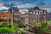 Twilight Reverence at the Roman Forum - Fine art print of Rome, Lazio, Italy - As the last light of day brushes the Roman Forum in soft gold and lavender hues, ancient columns and crumbling temples stand like sentinels of memory - dignified, silent, eternal. Once the epicentre of Roman public life, these ruins now whisper forgotten orations and imperial grandeur into the cooling air. The dramatic interplay of clouds and evening light breathes new life into centuries-old stone, revealing textures and shadows shaped by time itself. This image captures not just a place, but a sensation - of reverence, of history, of timeless beauty. Perfect for a refined interior space, this piece infuses any room with classical elegance and contemplative depth. - Image ID: ITALY-ROME-ROMAN-FORUM-0002