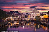  stock photography | St. Angelo Bridge and Vatican City from Umberto I Bridge, Rome, Lazio, Italy, Image ID ITALY-ROME-VATICAN-0002. Ponte Sant'Angelo and the dome of St Peter's Basilica, as seen from Ponte Umberto I - A bridge with a view. Ponte Sant'Angelo, ancient Pons Aelius, ancient Roman bridge, probably the finest surviving in Rome itself, built over the Tiber River by the emperor Hadrian (reigned 117-138 AD) to connect the Campus Martius with his mausoleum (later renamed Castel Sant'Angelo). Ponte Sant'Angelo is Rome's most beautiful bridge, with ten magnificent marble angels lining both sides of the bridge. The bridge's three central arches are still the originals from the ancient Roman era. In the seventeenth century two more arches were added, one on either side, to replace the original ramps that lead to the bridge. The bridge was further modified in the nineteenth century when the Tiber embankment was built to protect the city from floodwater. Today the bridge is pedestrianized; tourists pass here on their way to the Castel Sant'Angelo and the Vatican.