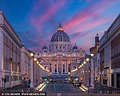  stock photography | Saint Peter's Basilica and Via della Conciliazione at Night, Rome, Lazio, Italy, Image ID ITALY-ROME-VATICAN-0003. Via della Conciliazione or Road of the Conciliation is one of the main streets in Rome, Italy with a good view of the St. Peter's Basilica. This street leads towards St. Peter's Square. Via della Conciliazione, the broad thoroughfare that leads to St Peter's Basilica, was built between 1936 and 1950. The road was initiated by Mussolini to celebrate the accord reached in 1929 between his government and the papacy, which settled the so-called Roman question. Since the facades of the buildings on either side of the new road did not align perfectly, traffic islands were erected along both sides, complete with rows of stone obelisks (doubling up as lampposts), in order to create the illusion of a perfectly straight thoroughfare.