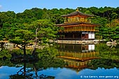  stock photography | Kinkakuji - Golden Pavilion, Kyoto, Kansai, Honshu, Japan, Image ID JP-KYOTO-GOLDEN-PAVILION-0002. Kinkakuji (also known as 'Golden Temple' or 'Golden Pavilion') is one of Kyoto's best-known attractions. It was built in 1393 as a retirement villa for Shogun Yoshimitsu Ashikaga. He intended to cover the exterior with gold, but only managed to coat the the ceiling of the third floor with gold leaf before his death. After his death, his son converted the building into a Zen temple of the Rinzai school named Rokuonji, in accordance with Ashikaga's wishes.