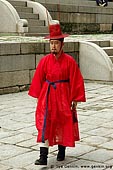 korea stock photography | Man in a Traditional Costume at Gyeonghuigung Palace in Seoul, South Korea, Seoul, South Korea, Image ID KR-SEOUL-GYEONGHUIGUNG-0002. 