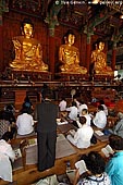 korea stock photography | In Prayer for Buddha Inside Jogyesa Temple in Seoul, South Korea, Gyeonji-dong, Jongno-gu, Seoul, South Korea, Image ID KR-SEOUL-JOGYESA-0012. 