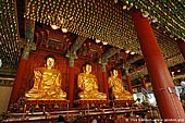 korea stock photography | Three Golden Buddha Statues Inside Jogyesa Temple in Seoul, South Korea, Gyeonji-dong, Jongno-gu, Seoul, South Korea, Image ID KR-SEOUL-JOGYESA-0013. 