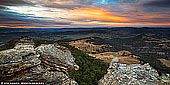 landscapes stock photography | Hassans Walls at Sunrise, Lithgow, Blue Mountains, New South Wales (NSW), Australia, Image ID AU-HASSANS-WALLS-0001. Hassans Walls Lookout is located in about 10 km south of Lithgow and it is the highest lookout in the Blue Mountains (approximately 1100 metres above sea level). The Sir Joesph Cook boardwalk provides easy access to the magnificent 180 degree view of the Blue Mountains escarpment and rolling valleys below. This lookout gives magnificent views over the Hartley Valley, as well as views of Lithgow. From the top, one can look out to Mt Wilson, Mt York, Mt Tarana and Mt Blaxland. To the south are the Kanimbla and Megalong Valleys and Mt Bindo (1363 m). It is the highest scenic lookout (1130m) in the Blue Mountains.