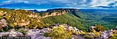 landscapes stock photography | Narrow Neck and Megalong Valley, Katoomba, Blue Mountains National Park, NSW, Australia, Image ID AU-NARROW-NECK-MEGALONG-VALLEY-0001. Overlooking the gigantic Megalong Valley, Cahill's Lookout is one of the most impressive lookouts in the Blue Mountains, but without the big tourist crowds. Quietly tucked away along the westernmost point of Cliff Drive, the lookout offers breathtaking views of the valley, Megalong Head, Boars Head Rock and the Narrow Neck Peninsula. A short but scenic 500m walking track beings visitors to this beautiful lookout, which consists of one large viewing platform and two smaller ones on each side. The walk also passes the Boars Head Lookout, from where you can can enjoy views of a unique rock formation that resembles, you guessed it, a boar's head. And it actually does, with a bit of healthy imagination. There are two things that make the Cahill's Lookout unique compared to most other lookout points in the area. Firstly, despite the fact that this lookout is one of the prettiest lookout points in the Blue Mountains, the big crowds haven't yet discovered this magnificent spot. Which is great, because it allows visitors to really enjoy the serenity of the area. Secondly, unlike lookouts such as Echo Point and Lincoln's Rock that overlook the Jamison Valley, Cahill's Lookout faces the Megalong Valley, which provides a somewhat different scenery. The Narrow Neck Peninsula, clearly visible from the viewing platform, is the plateau in the middle that divides the two large valleys.