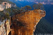 landscapes stock photography | Hanging Rock at Dawn, Baltzer Lookout, Blackheath, Blue Mountains, NSW, Australia, Image ID HANGING-ROCK-BLUE-MOUNTAINS-0001. Stock image of a huge, overhanging block of sandstone called The Hanging Rock near Blackheath in Blue Mountains National Park, NSW, Australia at twilight.