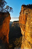 landscapes stock photography | Hanging Rock at Dawn, Baltzer Lookout, Blackheath, Blue Mountains, NSW, Australia, Image ID HANGING-ROCK-BLUE-MOUNTAINS-0004. Stock image of a spectacular scenery of the Grose Valley at sunrise as seen through a narrow slot between The Hanging Rock and the Baltzer Lookout wall in the Blackheath region, Blue Mountains National Park, Australia.