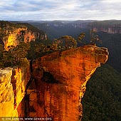 landscapes stock photography | Hanging Rock at Sunrise, Baltzer Lookout, Blackheath, Blue Mountains, NSW, Australia, Image ID HANGING-ROCK-BLUE-MOUNTAINS-0006. The walk to Baltzer Lookout rewards you with excellent scenery and a view over the stunning Hanging Rock (aka the Finger). A huge, overhanging block of sandstone over 100m high, jutting out into the Grose Valley, has become detached from the main cliff. It has featured in many calendars and climbing photos, and was also the site of the main climbing scene in 'The Edge' movie.