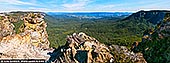 Open Horizon - Fine art print of Megalong Valley, Blue Mountains National Park, NSW, Australia - Held beneath a clear blue sweep, the valley unfolds in vast layers of forest, sandstone and distant escarpment. Its immense openness brings a sense of release into a room - quieting the mind, restoring perspective and creating the feeling of standing at the edge of something timeless. As a commanding design anchor, the deep eucalyptus greens, sun-warmed stone and luminous blues introduce both grounded strength and expansive light to refined living spaces, private retreats or executive interiors. Presented in a large-format museum scale, the panoramic composition truly comes alive, extending the visual boundaries of the room and turning the wall into an open horizon. - Image ID: MEGALONG-VALLEY-0003