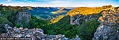 landscapes stock photography | Wolgan Valley Panorama at Sunset, Gardens of Stone, Greater Blue Mountains, NSW, Australia, Image ID WOLGAN-VALLEY-0002. Panoramic view of the Wolgan Valley with Donkey and Wolgan Mountains in the distance at Sunset. Wolgan Valley is the part of Gardens of Stone National Park. Its rock formations are sensational, its lookouts and bushwalks afford sprawling views, and it is home to a wide array of birdlife and wildlife.