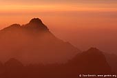 landscapes stock photography | Sunrise from Stone Monkey Gazing Over a Sea of Clouds Lookout, Baiyun Scenic Area, Huangshan (Yellow Mountains), China, Image ID CHINA-HUANGSHAN-0006. 
