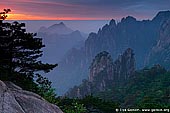 landscapes stock photography | Sunrise from Stone Monkey Gazing Over a Sea of Clouds Lookout, Baiyun Scenic Area, Huangshan (Yellow Mountains), China, Image ID CHINA-HUANGSHAN-0008. 