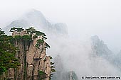 landscapes stock photography | View from Beginning to Believe Lookout, Beihai (North Sea) Scenic Area, Huangshan (Yellow Mountains), China, Image ID CHINA-HUANGSHAN-0010. From the Beginning-to-believe lookout tourists may enjoy the beautiful scenery of the Beginning-to-believe Peak (Shixin Peak) and Beihai (North Sea) Scenic Area.