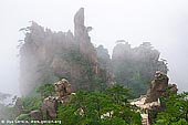 landscapes stock photography | Xihai (West Sea) Canyon Scenery, Huangshan (Yellow Mountains), Anhui Province, China, Image ID CHINA-HUANGSHAN-0011. The Xihai Grand Canyon (West Sea Grand Canyon), also commonly referred to as the Magic Scenic Area, is one of the most beautiful sites on Huangshan Mountain. Recently hiking trips through this canyon has becoming extremely popular. Scenery keeps changing as you walk on steep steps usually clinging to precipices. Every step reveals a breath-taking view so you can just point your camera and take a perfect photo almost everywhere on the way.