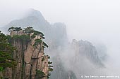 landscapes stock photography | Clouds over Beihai (North Sea) Scenic Area, Beginning to Believe Lookout, Huangshan (Yellow Mountains), China, Image ID CHINA-HUANGSHAN-0017. Stock image of the clouds covered Beihai (North Sea) Scenic Area. View from the Beginning-to-believe lookout.