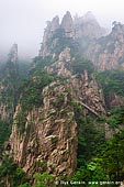 landscapes stock photography | High Peaks of the Xihai (West Sea) Grand Canyon, Baiyun Scenic Area, Huangshan (Yellow Mountains), China, Image ID CHINA-HUANGSHAN-0024. Stock photo of the high peaks of the Xihai Grand Canyon (West Sea Grand Canyon) and stone stairway on the side of high cliffs in Huangshan (Yellow Mountains) in Anhui Province of China.