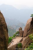 landscapes stock photography | Huangshan Landscape Above Fairy-walking Bridge, Xihai (West Sea) Grand Canyon, Baiyun Scenic Area, Huangshan (Yellow Mountains), China, Image ID CHINA-HUANGSHAN-0025. People are having rest on a lookout near Fairy-walking Bridge in Xihai Grand Canyon (West Sea Grand Canyon) in Huangshan Mountains (Yellow Mountains) in Anhui Province of China.