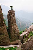 landscapes stock photography | Hiking Up Above Fairy-walking Bridge, Xihai (West Sea) Grand Canyon, Baiyun Scenic Area, Huangshan (Yellow Mountains), China, Image ID CHINA-HUANGSHAN-0026. Stock image of the landscape of the Fairy-walking Bridge lookout and Xihai Grand Canyon (West Sea Grand Canyon) in Huangshan Mountains (Yellow Mountains) in Anhui Province of China.