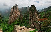 landscapes stock photography | View from Beginning to Believe Lookout, Beihai (North Sea) Scenic Area, Huangshan (Yellow Mountains), China, Image ID CHINA-HUANGSHAN-0027. Panoramic view of the Shixin Peak and the gorge from Beginning to Believe Lookout in Beihai Scenic Area (North Sea) in Huangshan Mountains (Yellow Mountains) in Anhui Province of China.