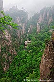 landscapes stock photography | Service Station in Xihai (West Sea) Grand Canyon, Huangshan (Yellow Mountains), China, Image ID CHINA-HUANGSHAN-0028. Stock photo of the service station on the side of high cliffs of the Xihai Grand Canyon (West Sea Grand Canyon) in Huangshan (Yellow Mountains) in Anhui Province of China.