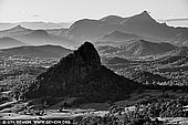 landscapes stock photography | Mount Warning, The Northern Rivers, NSW, Australia, Image ID AU-MOUNT-WARNING-0003. Mt Warning, or Wollumbin is an Extinct Volcano. It is the focal point of World Heritage Listed Wollumbin National Park, is possibly the most impressive natural feature on the North Coast.  Mt Warning is well worth climbing at least once. The view from the top of Mt Warning will take your breath away. From the summit of Mt Warning you can see the Gold Coast skyline, north to Queensland with the Glass House Mountains in the distance. To the West towards the NSW interior, you can see a vast display of mountain peaks with the Great Dividing Range in the distance. South, you can see villages, rivers dams and more mountains with the coastline drawing a line between the land and the ocean. To the east you can see the Pacific Ocean disappearing into the skies on the horizon. The Cape Byron lighthouse is far away in the distance and you can also make out Julian Rocks off Byron Bay jutting up out of the sea. There are a number of viewing platforms on the summit, making it safer for visitors and protecting the landscape from all the human traffic.