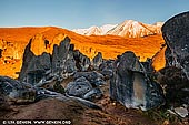 landscapes stock photography | Castle Hill, Canterbury Region, South Island, New Zealand, Image ID NZ-CASTLE-HILL-0005. Limestone boulders on Castle Hill at sunrise with Mount Enys in the background. Castle Hill, Canterbury, New Zealand.