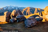 landscapes stock photography | Early Morning at Castle Hill, Canterbury Region, South Island, New Zealand, Image ID NZ-CASTLE-HILL-0006. Limestone boulders on Castle Hill at sunrise overlooking the Canterbury Plains and Castle Hill Peak. Castle Hill, Canterbury, New Zealand.