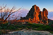 landscapes stock photography | The Cathedral Rock at Sunrise, Mount Buffalo National Park, Australian Alps, VIC, Australia, Image ID AU-MOUNT-BUFFALO-0003. First warm rays of the sun highlighted the Cathedral in Mount Buffalo National Park, Hight Country, Victoria, Australia. Mount Buffalo is a truly spectacular national park in Victoria's high country and offers outdoor enthusiasts numerous activities including cross country and downhill skiing, rock climbing, abseiling, buskwalking and landscape and wildlife photography.
