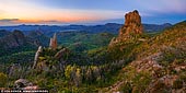 landscapes stock photography | The Breadknife and Belougery Spire after Sunset, Warrumbungle National Park, New South Wales (NSW), Australia, Image ID AU-WARRUMBUNGLES-0003. Shaped by an ancient volcano that has eroded over millions of years, the distinctively rugged landscape and rich biodiversity of the Warrumbungle National Park provides important habitat for a range of native Australian flora and fauna. Located near Coonabarabran in central NSW it is often described as a place where east meets west, where the moist, vibrantly green landscape gradually merges into the dry plains of western NSW. The beauty and sculptural forms of the Warrumbungle landscape were noted by early European explorers. In 1818, Surveyor-General Oxley said on encountering the landscape for the first time: 'To the west the land was level, but to the east a most stupendous range of mountains, lifting their blue heads above the horizon, bounded the view in that direction, and were distant at least seventy miles, the country appearing a perfect plain between us and them.'