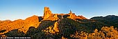 landscapes stock photography | The Breadknife and Belougery Spire Panorama at Sunset, Warrumbungle National Park, New South Wales (NSW), Australia, , Image ID AU-WARRUMBUNGLES-0006. Covering more than 19 651 hectares, the Warrumbungles are one of the state's most popular national parks. The Warrumbungles are a group of eroded volcanic cores and dykes, forming a landscape of sharp, narrow peaks and rounded domes. Added to the National Heritage List in 2006, the area is popular with rock climbers and home to one of Australia's Great walks - the Grand High Tops track. The centre of the Park is located about 45km south-west of Coonabarabran with the park encompassing some of the region's best hidden treasures, from sacred Aboriginal sites to a special micro-climate where east meets west.