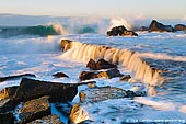 landscapes stock photography | Waves Crashing at Forresters Beach, Forresters Beach, Central Coast, NSW, Australia, Image ID AU-FORRESTERS-BEACH-0001. Waters crashing against the Forresters Beach rocks along the shore of Central Coast of NSW of Australia, create magnificently memorable coastal wave action scenery enjoyed by nature loving tourists. You can practically feel the spray of the ocean in this image that depicts the spectacular wave action of the ocean water as it crashes in and breaks against the famous Forresters Beach shoreline of Central Coast of NSW of Australia.