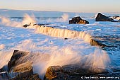 landscapes stock photography | Hight Tide Waves at Forresters Beach, Forresters Beach, Central Coast, NSW, Australia, Image ID AU-FORRESTERS-BEACH-0004. A dramatic coastline of rugged rocks along the Forresters Beach on the Central Coast of NSW of Australia. The brilliant light of sunrise lights crashing waves.