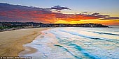 landscapes stock photography | Amazing Sunrise Above Bondi Beach, Sydney, NSW, Australia, Image ID AU-BONDI-BEACH-0001. Fascinating cloud formations of extraordinary hues fill the sky at sunrise over Bondi Beach in Sydney, NSW, Australia. A dramatic sunrise is captured while clouds hang low over the Bondi Beach. This breathtaking scenery is just one of the elements that attracts visitors to this area of Sydney and Eastern Beaches.