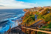 landscapes stock photography | Bondi to Coogee Coastal Walk at Sunrise #1, Bronte, Sydney, NSW, Australia, Image ID AU-BONDI-TO-COOGEE-WALK-0001. The Bondi to Coogee walk is perhaps the most famous coastal hiking trail in Sydney, New South Wales and perhaps even Australia. Tourists from all over the world and local Sydney-siders alike come to Sydney's east coast every day to enjoy Australia's best beaches, stunning ocean views and lots of parks, cafe's and restaurants on the way from Bondi Beach to Coogee Beach. The beaches and parks offer a place to rest, swim or a chance to eat at one of the cafes, hotels, restaurants or takeaways. All beaches offer picnic shelters, electric barbecues, play areas, kiosks, toilets and change-rooms. The walk is not difficult, there are medium gradient paths and several staircases with occasional seating. It takes about two hours to complete the Bondi to Coogee Beach section of the walk and another hour and a half if you choose to continue to Maroubra.