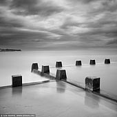 landscapes stock photography | Coogee Beach, Sydney, NSW, Australia, Image ID AU-COOGEE-BEACH-0001. Fine art black and white minimalist photography of the tidal pool at the Coogee Beach in Sydney, NSW, Australia with dramatic clouds.