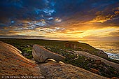 landscapes stock photography | Dramatic Sunrise at The Remarkable Rocks, Flinders Chase National Park, Kangaroo Island, SA, Australia, Image ID KI-REMARKABLE-ROCKS-0004. The Remarkable Rocks in Flinders Chase National Park on Kangaroo Island, Australia is one of the best spots in Australia to watch sunrise. This natural formation of granite boulders, perched on a large rock provides a great location for a sunrise photograph. Too early for tourists, it's an opportunity to begin the day in peaceful solitude as the light of the rising sun hits the boulders.