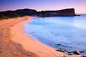 landscapes stock photography | Early Morning at Avalon Beach, Sydney, NSW, Australia, Image ID AU-AVALON-BEACH-0005. Avalon Beach is a famous curved surfing beach on the Sydney's Northern Beaches, Australia, which once had large sandhills which extended back to what is now a recreation reserve. A popular beach for surfers it is patrolled during the summer months and has a swimming pool at the Southern end. The local village is roughly ten minutes walking with a few cafes, some boutique shops, restaurants and a cinema. There is also a really good backpackers hostel in Avalon.