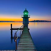 landscapes stock photography | Bradleys Head Lighthouse at Sunrise, Bradleys Head, Sydney, NSW, Australia, Image ID AU-BRADLEYS-HEAD-0001. Bradleys Head Light is a small, 6.7m, active lighthouse located at Bradleys Head, a headland protruding from the north shore of Sydney Harbour, within the metropolitan area of Sydney, New South Wales, Australia. It was built in 1905 due to numerous accidents at the tip of Bradley's Head. The lighthouse is mounted on a rock and connected to shore by a footbridge. You can take a stroll from the Taronga Zoo Wharf or drive down Bradley Head Road. Once there you can admire the tower and explore the 1839 gun emplacements and mast of the HMAS Sydney Mast. The views back towards the harbour will also captivate you. 