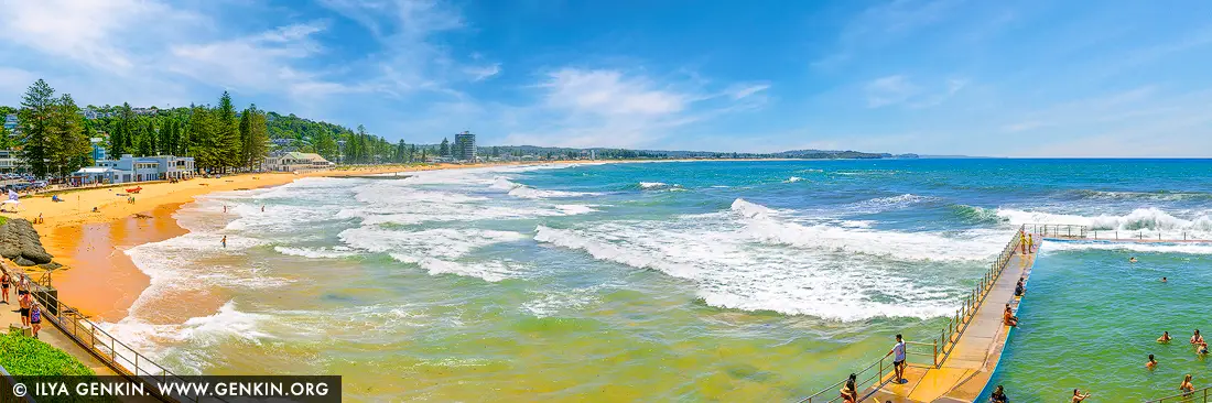 Sunlit Swell at Collaroy Beach - Fine art print of Sydney, NSW, Australia - Waves crash with rhythmic intensity along the sun-drenched sands of Collaroy Beach, where the vibrant energy of a summer's day pulses through every frame. The iconic Collaroy Rock Pool juts into the swirling sea, offering a sheltered sanctuary as the Pacific roars just beyond. Surfers carve through the rolling swell while beachgoers bask beneath the brilliant Australian sky, framed by Norfolk pines and the laid-back charm of Sydney's Northern Beaches. This captivating coastal moment blends motion and calm, making it an uplifting statement piece - perfect for adding warmth, vitality, and the spirit of the ocean to any living room, office, or beachside retreat. - Image ID: AU-COLLAROY-BEACH-0001