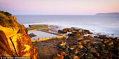 landscapes stock photography | Sunset at North Curl Curl Rockpool, Sydney, NSW, Australia, Image ID AU-CURL-CURL-0001. Beautiful 2:1 panoramic image of the rock pool at the end of the headland at North Curl Curl Beach in Sydney, NSW, Australia. During high tide it can only be accessed via the coastal walk across the headland.