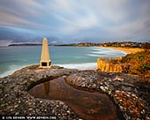 landscapes stock photography | Sunrise at North Curl Curl Beach, Sydney, NSW, Australia, Image ID AU-CURL-CURL-0013. Beautiful sunrise at North Curl Curl Beach in Sydney, NSW, Australia. At North Curl Curl an obelisk was erected in memory of 10 soldiers from the district who died in service or were killed in action during World War One. It was built of concrete in 1917, and stands on a large rock base, overlooking the spot where these men used to spend their weekends.