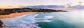 landscapes stock photography | Freshwater Beach at Dawn, Sydney, NSW, Australia, Image ID AU-FRESHWATER-BEACH-0001. On the very first day of the summer golden sun rays illuminated the Freshwater Beach in Sydney, NSW, Australia and the clouds and sky above in warm hues.