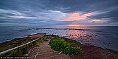 landscapes stock photography | Sunrise on a Cloudy Morning at Long Reef, Sydney, NSW, Australia, Image ID AU-LONG-REEF-POINT-0008. Panoramic image of a beautiful dramatic sunrise on a very cloudy morning above the popular Long Reef Point on famous Sydney's Northern Beaches in Australia.