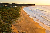 landscapes stock photography | Golden Sunrise at Mona Vale Beach, Mona Vale Beach, Sydney, NSW, Australia, Image ID AU-MONA-VALE-0005. From the lookout on the hills of Robert Dunn Natural Reserve in Sydney, Australia, visitors have stunning views of the Mona Vale Beach and the ocean. During a typical east coast sunrise, the scenery is ignited and the grasses and sand glow in the golden light.