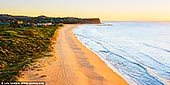 landscapes stock photography | Golden Sunrise at Mona Vale Beach, Sydney, NSW, Australia, Image ID AU-MONA-VALE-0007. From the lookout on the hills of Robert Dunn Natural Reserve in Sydney, Australia, visitors have stunning views of the Mona Vale Beach and the ocean. During a typical east coast sunrise, the scenery is ignited and the grasses and sand glow in the golden light.