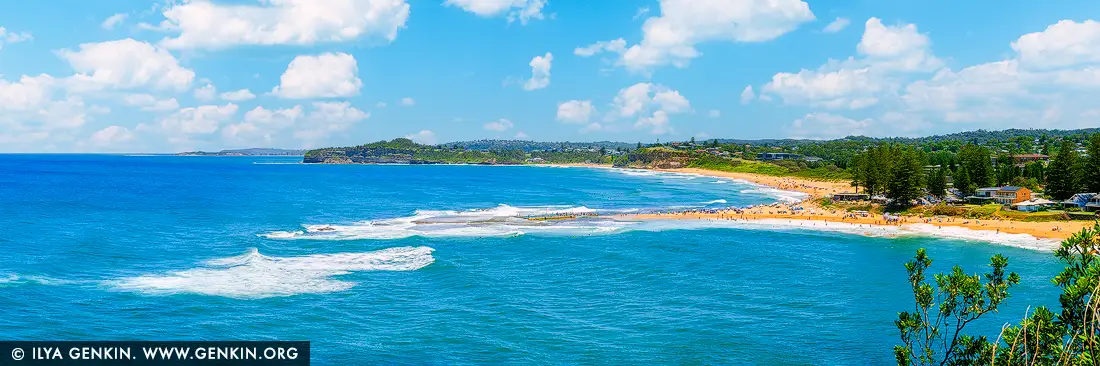 Turquoise Bliss at Mona Vale - Fine art print of Sydney, NSW, Australia - Under a radiant summer sky, the golden sands of Mona Vale Beach curve gracefully along Sydney's Northern Beaches, kissed by the rhythmic pulse of turquoise waves. The iconic Mona Vale Rock Pool gleams at the peninsula's edge, where swimmers bask in the sunlight as the ocean stretches endlessly into sapphire tones. Framed by lush coastal greenery and the relaxed charm of beachside homes, this panoramic scene captures the essence of Australian summer - vibrant, carefree, and alive with energy. A celebration of warmth, color, and coastal serenity, this piece brings brightness and vitality into any space - ideal for refreshing a beach house, living room, or creative studio with the spirit of summer by the sea. - Image ID: AU-MONA-VALE-0010