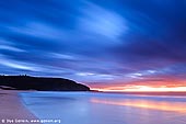 landscapes stock photography | Barrenjoey and Palm Beach at Sunrise, Palm Beach, Sydney, NSW, Australia, Image ID PALM-BEACH-BARRENJOEY-0001. A beautiful landscape wallpaper pictures of a sunrise and moving clouds taken at Palm Beach, NSW, Australia as the sun rises and beautiful hues light the morning sky over the sandy Pacific coastline while Barrenjoey Lighthouse shines on top of the Barrenjoey Headland. Deep blue sky has been taken over by cloud formations. As another day awaits the arrival of the Sun, the stunning sunrise filters through the clouds and shines off the water.